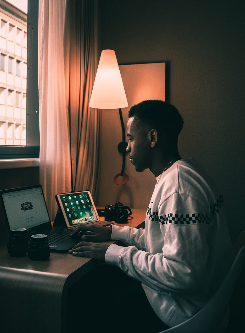 Person reading from a computer.